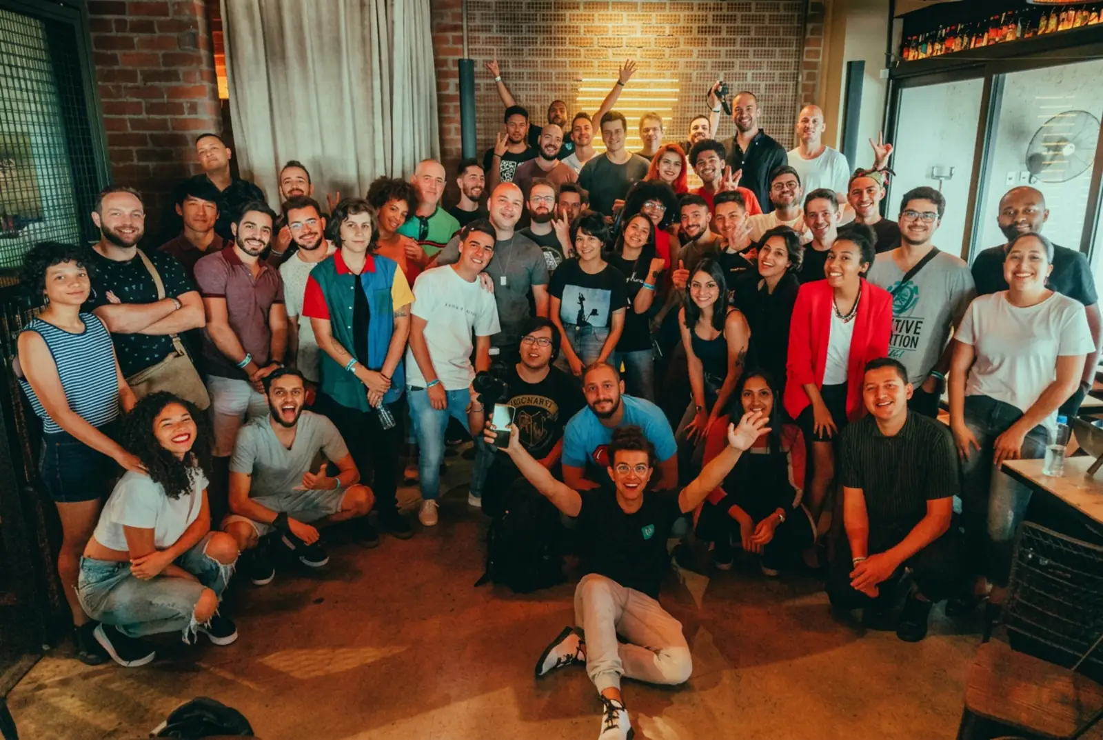 A large remote team gathered together at a company offsite